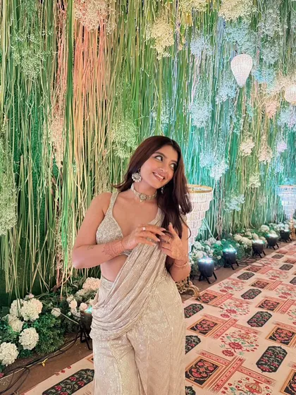 Another beautiful shot of this wedding guest. Her makeup is kept soft and luminous, allowing her natural beauty and the stunning decor to shine.