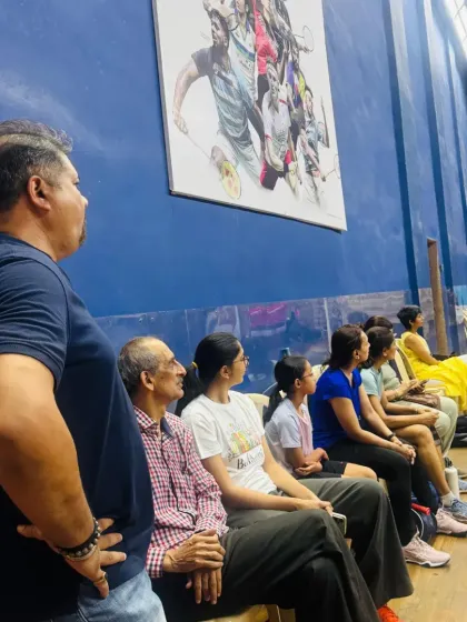 Parents and spectators watching the matches at the WCG Women's Special Event. A supportive audience is key to a player's confidence.
