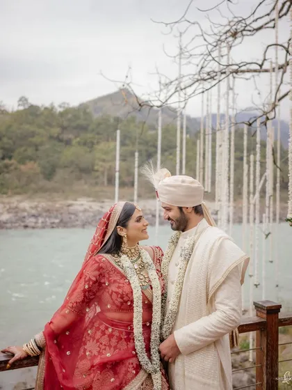 A spiritual moment for Pragya and Adi, with the majestic Ganges flowing behind them. Getting married in the lap of nature adds a profound permanence to the promises being made. We seek out these serene, soulful backdrops that become a part of the couple's story.