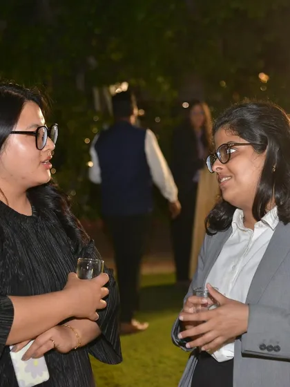 Engaged in a conversation at the IFCCI & IGCC Women's Day event. Making meaningful connections is a key part of my professional life.