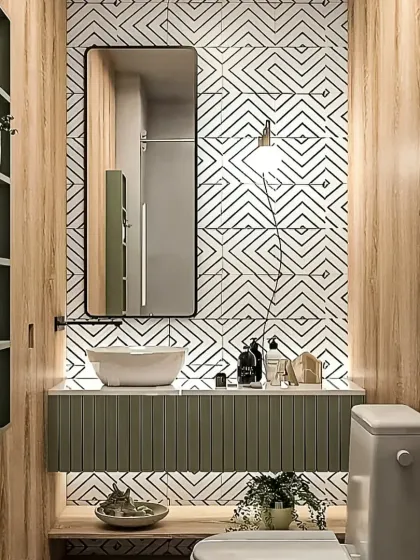 Even a small bathroom can be a style statement. We used a mix of wood-look panels and bold geometric tiles to add character, while the floating vanity and backlit mirror create an illusion of spaciousness.