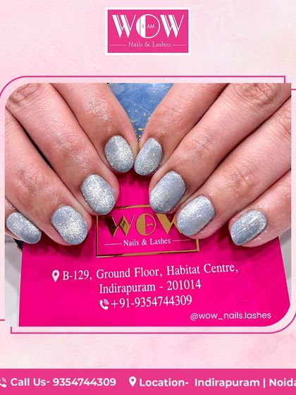 A simple yet stunning manicure featuring a full coat of sparkling silver glitter polish. This look is perfect for parties, holidays, or any day you want to feel extra glamorous.
