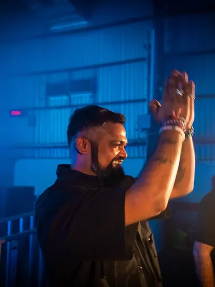 A moment of pure gratitude and happiness, clapping for the crowd. Their energy is what makes every show special.