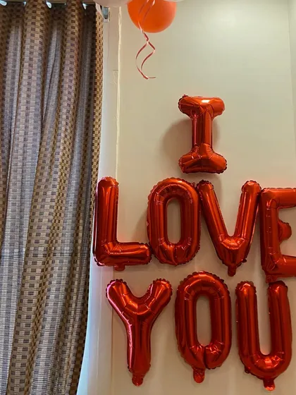 Sometimes a simple message is the most powerful. I can add custom foil balloon messages like 'I Love You' to any decoration package, making it a perfect addition for anniversaries, proposals, or just because.