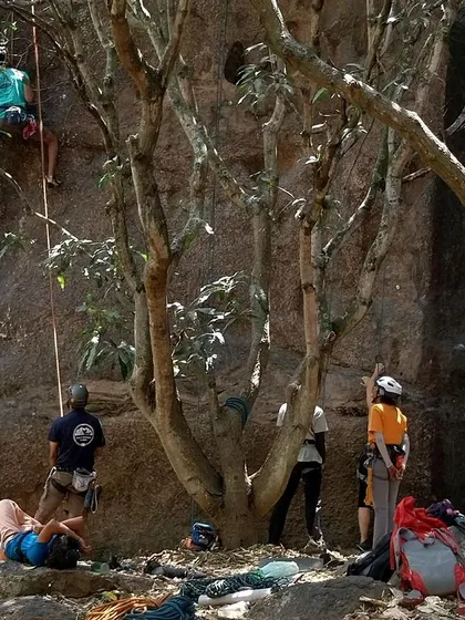 Climbers spread out across the wall at Gethnaa, with volunteers belaying and spotting. We ensure a high instructor to participant ratio for personalized attention and safety.