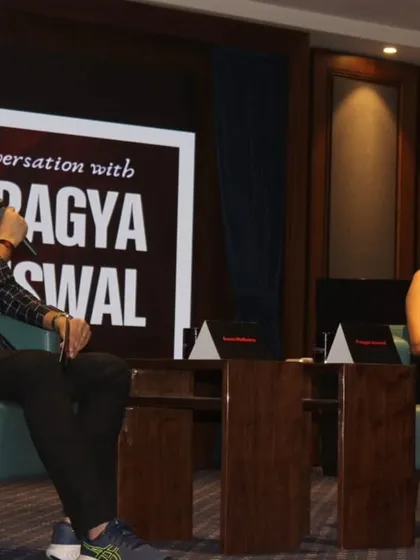 Sharing a laugh with Pragya Jaiswal. A relaxed and friendly atmosphere on stage translates to a more engaged and receptive audience.