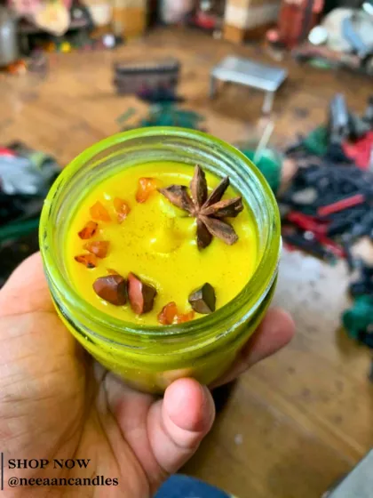 A burst of sunshine in a jar. This vibrant yellow candle is hand-poured with love and topped with healing crystals and spice magic.