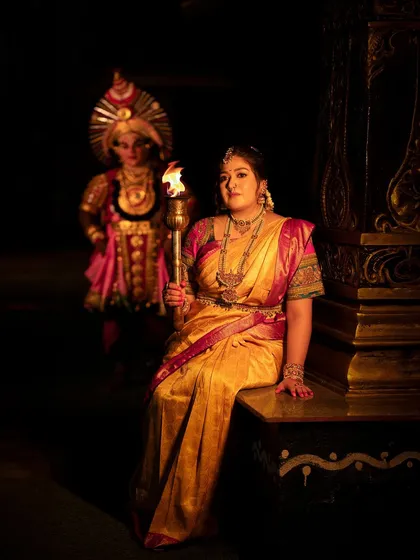 A variation of the "Belaku" concept, where the subject is seated, creating a different but equally powerful and contemplative mood.