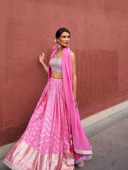 This extensive collection features a wide array of modern festive attire. From vibrant sharara sets and elegant anarkalis to chic jumpsuits and light lehengas, these pieces are curated for wedding guests and anyone looking for a stylish outfit for a special occasion.