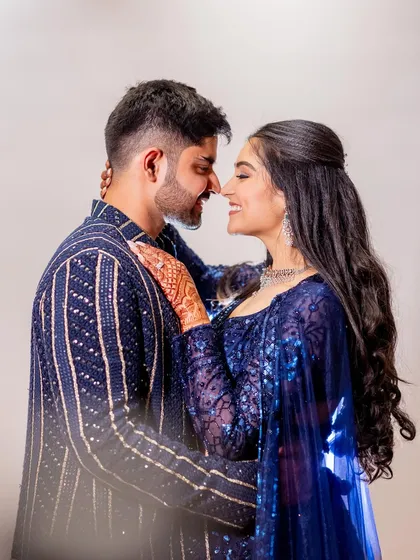 A sangeet night calls for a bit of sparkle. We went for coordinated deep blue outfits that were perfect for an evening of dance and celebration, proving that you can be both glamorous and in sync.