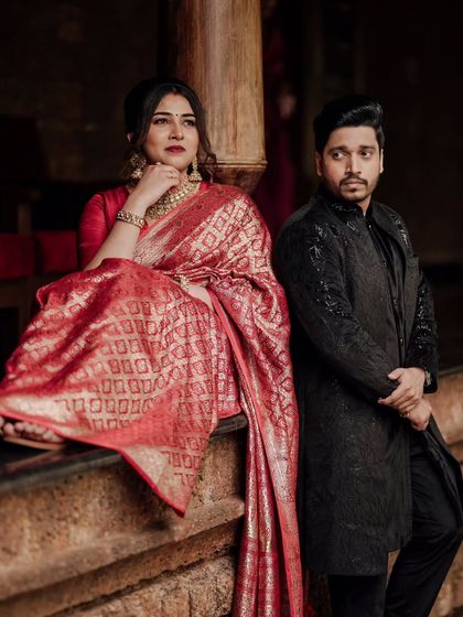 Another gorgeous shot of the couple from their reception. The groom's elegant black outfit provides a beautiful contrast to the bride's attire.