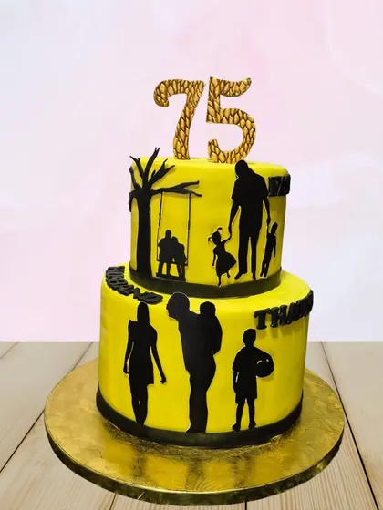 Cakes can tell a story. For a 75th birthday, I created this two-tiered cake with custom silhouettes depicting cherished family moments, making it a deeply personal and emotional tribute to a life well-lived.