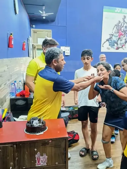 A fun moment from the coach's birthday celebration. These events strengthen the bond between coaches and students.