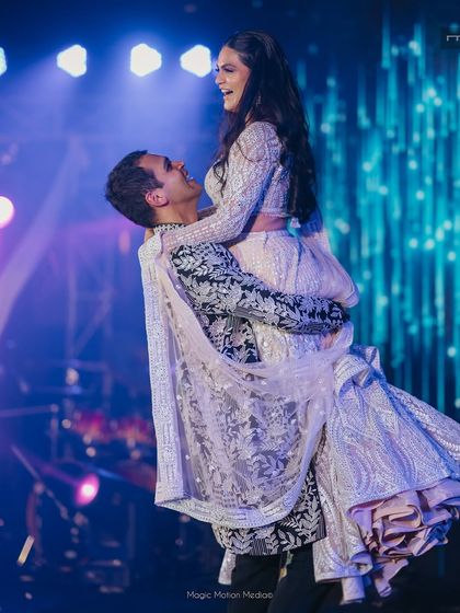 A classic Bollywood lift that never fails to impress. We ensure every couple's performance has these highlight moments that make the crowd go wild.