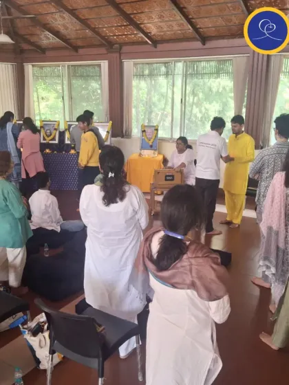 Devotees gather for a purification ceremony at the Rotary Club. The act of coming forward is an outward expression of an inner desire for spiritual growth.