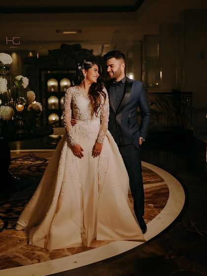 I created this custom-tailored navy tuxedo for my client Anirudh Garg's memorable night. The deep blue offers a sophisticated alternative to black, while the fit ensures pure elegance.