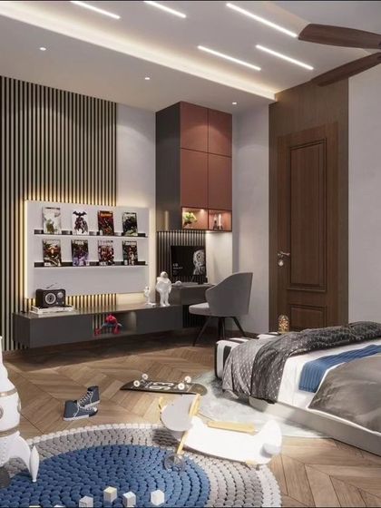 A bedroom is not just for sleeping; it's a space that reflects character. This kids' bedroom is designed for play and creativity, featuring a neon astronaut light, a rocket-themed rug, and a dedicated area for displaying collectibles and doing homework.