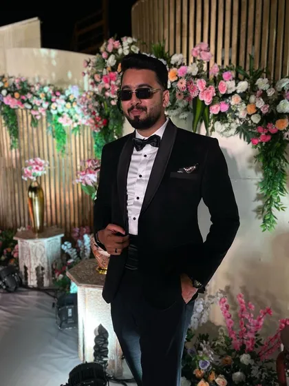 For a classic cocktail night or a formal corporate gala, I always come dressed to impress. A sharp black tuxedo look is perfect for setting a sophisticated and stylish tone before I hit the dance floor.