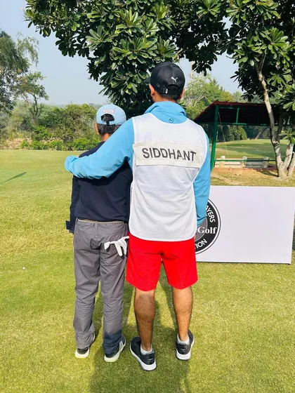 On the bag for my student, Siddhant. Being a caddie for my players in tournaments gives me invaluable insight into their game and mental process.