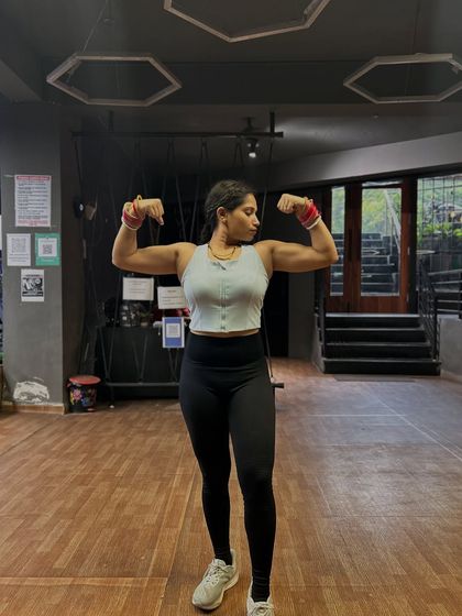 Taking a moment to appreciate the strength I've built. This journey is about feeling powerful and confident in your own skin.