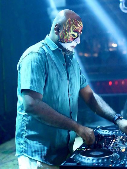 Rocking some face paint for a themed night. I love to get into the spirit of the party, whether it's Halloween or a glow-in-the-dark event.