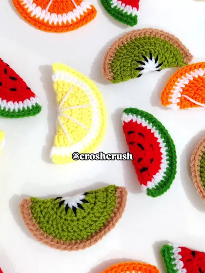 A bulk order of my fruit slice keychains, featuring watermelon, kiwi, orange, and lemon designs.