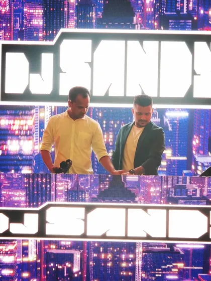Collaborating with another DJ for a large-scale event. Working with other artists is a great way to create a dynamic and varied musical experience.