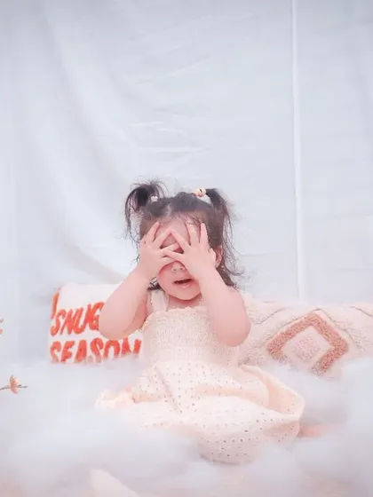 Peek-a-boo! The toddler years are full of personality, play, and endless curiosity. Our sessions are designed to let your little one's character shine through naturally.