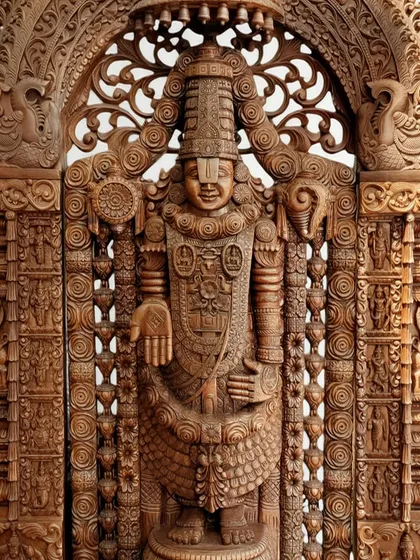 A detailed close-up of our 6-foot Lord Balaji statue, focusing on the divine face and upper body. Notice the precision in the carving of the crown, jewelry, and the serene yet powerful expression, all hallmarks of our Thammampatty tradition.