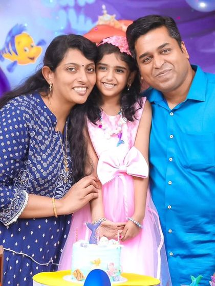 A thrilling 'Dinosaur' themed birthday party, with prehistoric backdrops, dinosaur cutouts, and lush greenery, transporting guests to a Jurassic world.