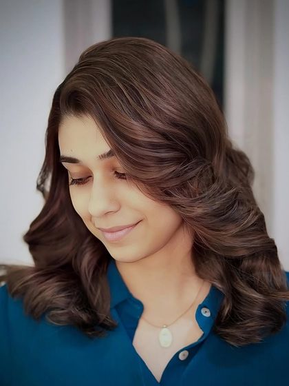 A three-quarter view of the soft brown balayage, highlighting the seamless blend of colors and the healthy shine of the hair.