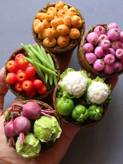 A handful of my miniature vegetable baskets, showing the vibrant colors and textures.