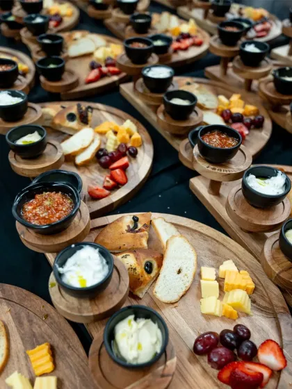 A beautiful shot of the cheese and bread platters that welcomed our guests at the Ratatouille screening. We believe in starting the experience from the moment you walk in, with aromas and tastes that set a Parisian mood.