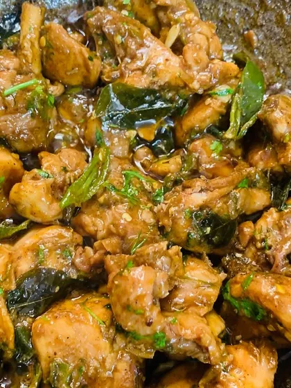 Another look at the chicken pepper fry, with fresh herbs mixed in.