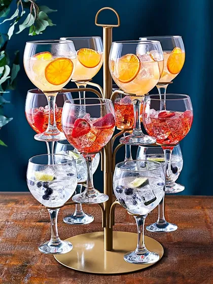 Introducing our Gin Tree, a perfect centerpiece for any gin lover's party. It's a unique way to serve a variety of botanical gin cocktails, offering guests a beautiful and interactive drink experience.