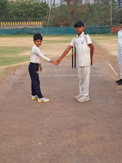 The pre-match handshake between captains, a tradition that teaches sportsmanship and respect for the opposition.