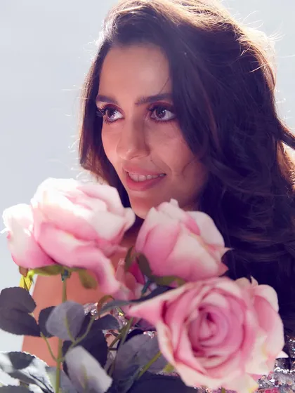 A dreamy, soft-focus shot in a floral Monique Lhuillier dress. This look is all about romance and femininity.