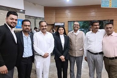 A group photo with colleagues and dignitaries at the Bar Council of Delhi's enrollment event.