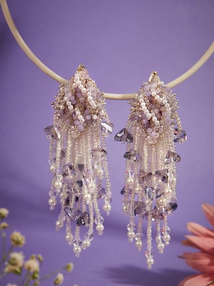 These lavender and crystal danglers are a testament to timeless design, still selling strong from a previous collection.