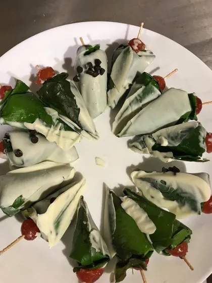 I love adding a modern twist to traditional flavours. This is my chocolate-dipped paan, a fusion dessert that is always a hit with guests. It’s a creative and delicious way to end a meal, combining the classic taste of paan with rich white chocolate.