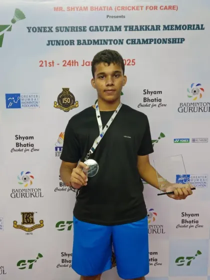 Vikrant Singh Negi with his trophy after winning the Boys' Doubles U15 title at the prestigious Gautam Thakkar Memorial Tournament.