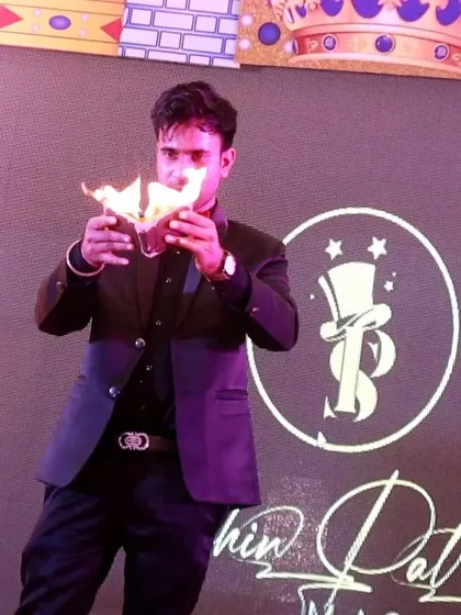 Fire magic is pure spectacle. This shot from a stage show in Vrindavan captures the moment I turn a simple wallet into a burst of flames, a classic illusion that always leaves the audience breathless.