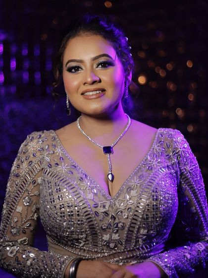 My doll-like client ready for her event. The makeup features a dramatic eye and soft lips.