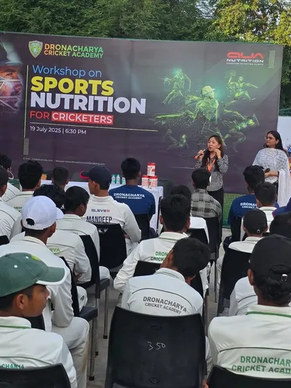 A view from behind our players as they attend the sports nutrition workshop. The names on their jerseys represent individuals, but they learn and grow as one team, understanding the collective importance of health and fitness.