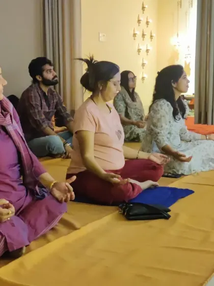 Participants deep in meditation after the Devi Abhishekam. The powerful vibrations of the ritual leave a lasting sense of peace and centeredness.