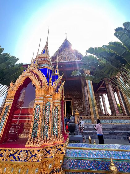 Exploring the beautiful grounds of a Thai temple. The ornate details and peaceful atmosphere offer a great contrast to the city's hustle.