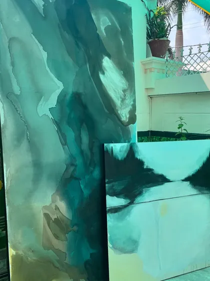Two of the finished pieces for the Lucknow cafe, one large vertical and one smaller square canvas, ready to be shipped.