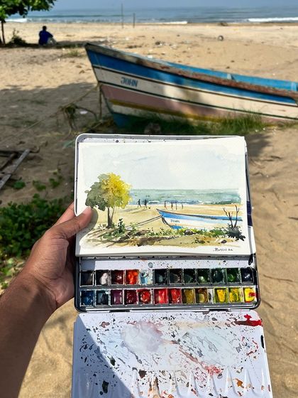 Another shot of my hometown beach painting, showing my watercolor palette and the messy, beautiful process.