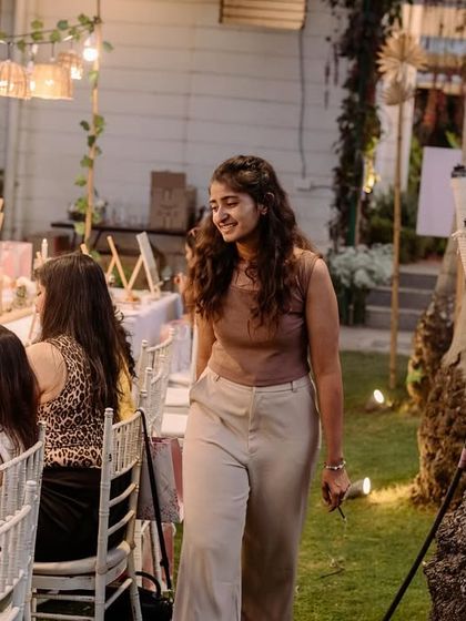 Walking through an outdoor coffee painting party I hosted. The ambiance was just as beautiful as the art being created.