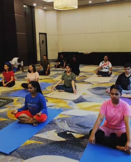 Another view of the yoga session, showing our team's dedication to practicing together. It's a moment of unity and shared purpose.